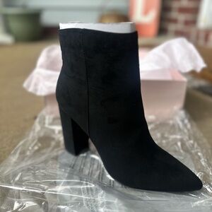 Women’s size 10, ankle boot from JUSTFAB. New in box